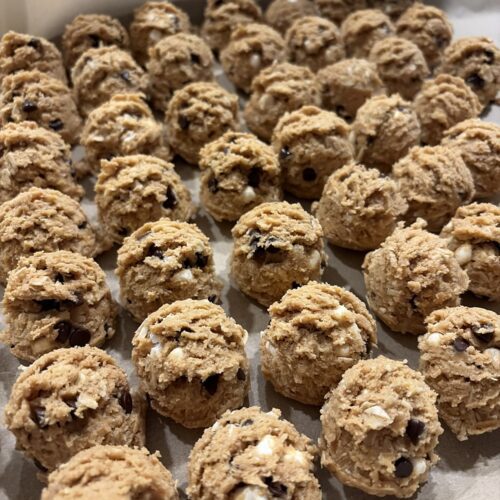 Tray of s'mores protein balls on parchment paper